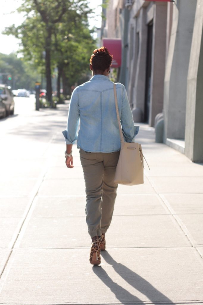 summer staples chambray shirt white tshirt olive joggers leopard pumps bucket bag rear